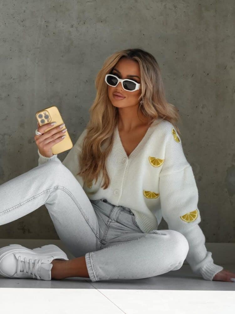 Ola Bianka's unbuttoned lemon jumper