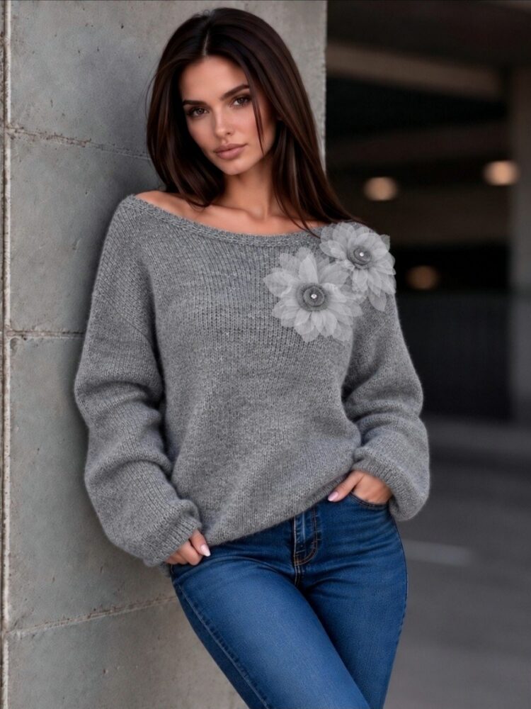 A jumper with decorative flowers 