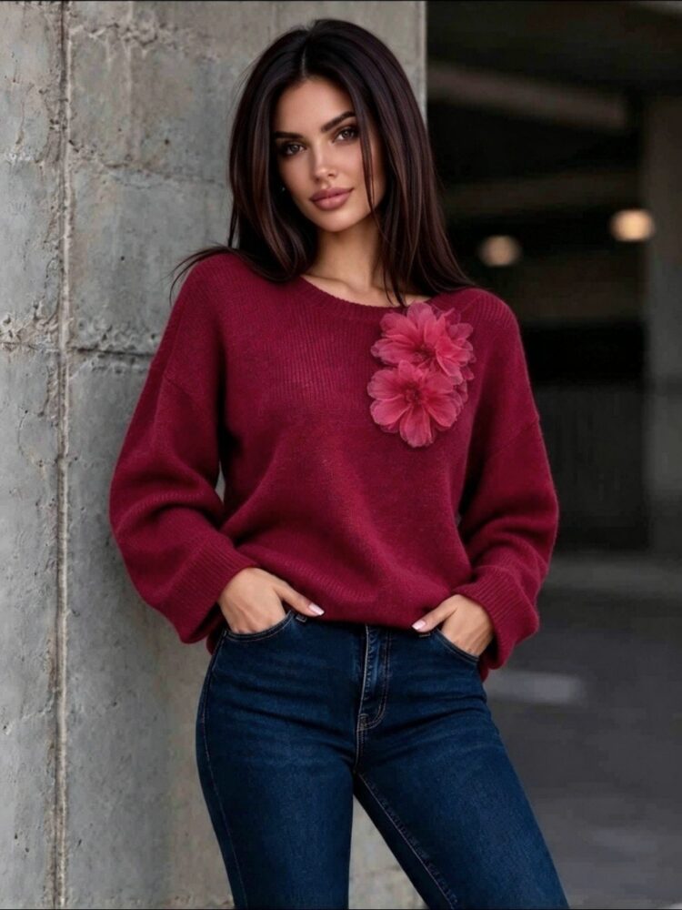 A jumper with decorative flowers 